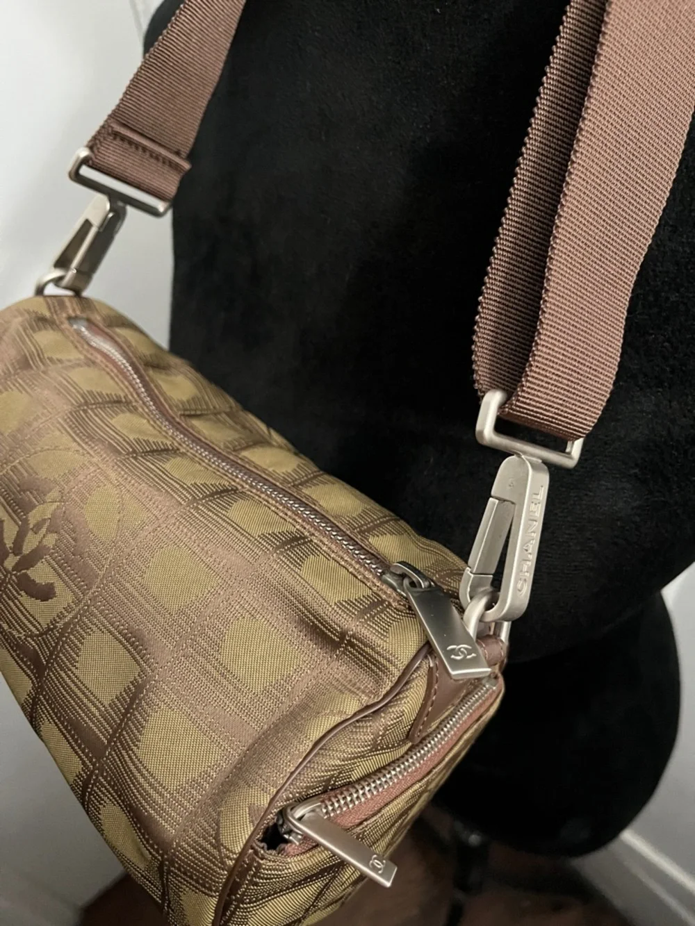 Chanel New Travel Line Mini Roll or Barrel Bag in a khaki or olive green color